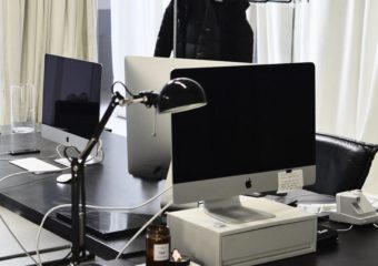 contemporary computers on tables of modern workspace